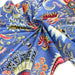 Tissu coton fin imprimé INDIENNES, bleu aux fleurs et motifs indiens multicolores - TissusPapi.com
