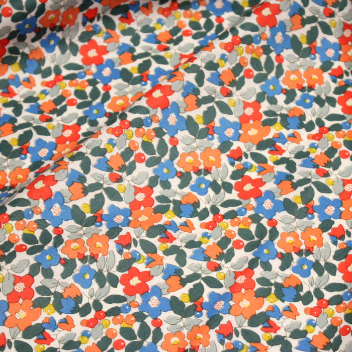 Tissu popeline de coton fleurie aux fleurs bleues, rouges et oranges - COLLECTION FLORALE