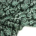 Tissu coton fin imprimé INDIENNES, vert bouteille aux fleurs et feuilles vertes et blanches - STANDARD 100 OEKO - TEX - TissusPapi.com