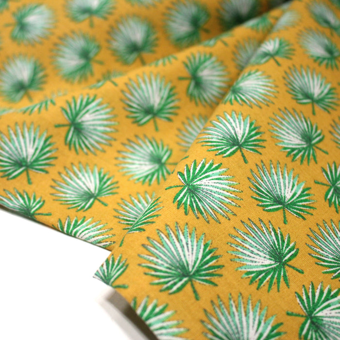 Tissu cotonnade jaune aux feuilles de palmier vertes - OEKO-TEX