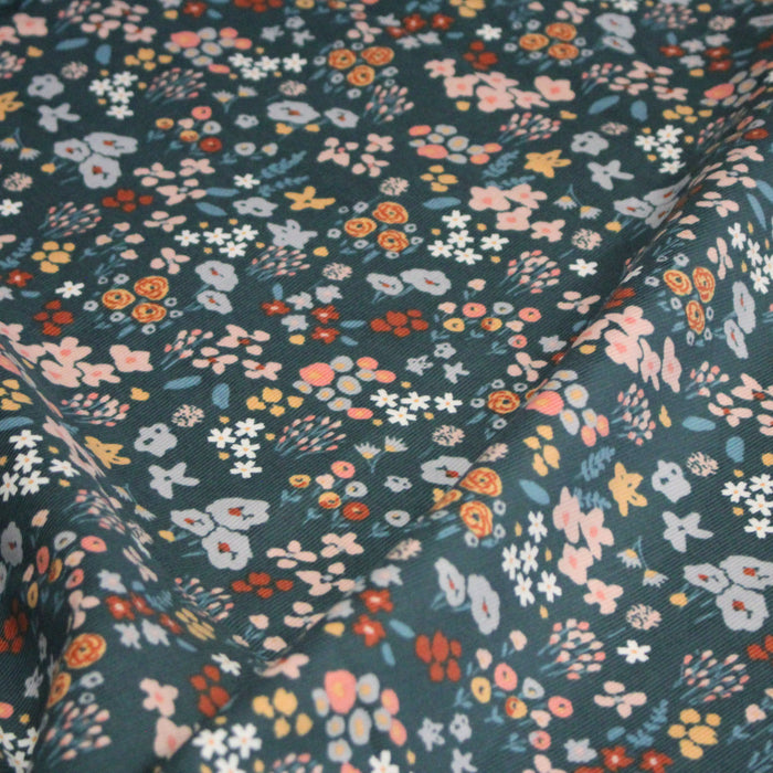 Tissu velours milleraies imprimé vert canard aux fleurs roses, bleus et ocres - OEKO-TEX