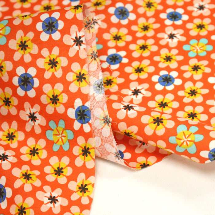 Tissu cotonnade orange aux fleurs multicolores - OEKO-TEX STANDARD 100