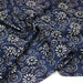 Tissu coton fin imprimé INDIENNES, fleurs et arabesques écrues, fond bleu - STANDARD 100 OEKO - TEX - TissusPapi.com