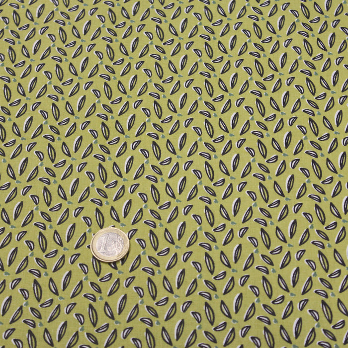 Tissu de coton vert anis aux feuilles blanches et noires - OEKO-TEX®