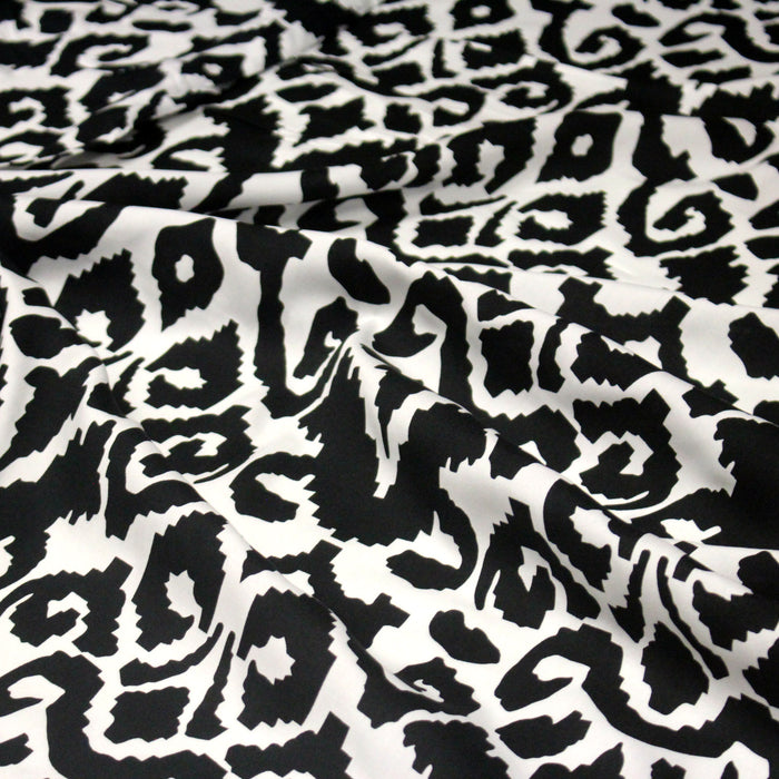 Tissu Viscose aux motifs ethniques géométriques noirs & blancs