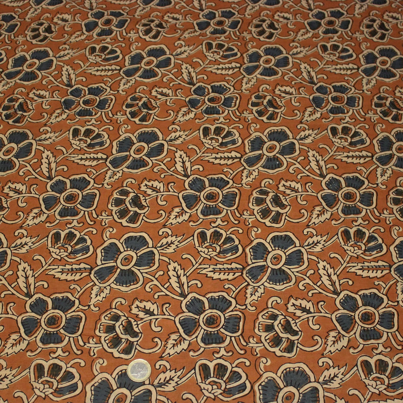 Tissu coton fin imprimé INDIENNES, fleurs bleues et écrues, fond ocre - STANDARD 100 OEKO - TEX - TissusPapi.com