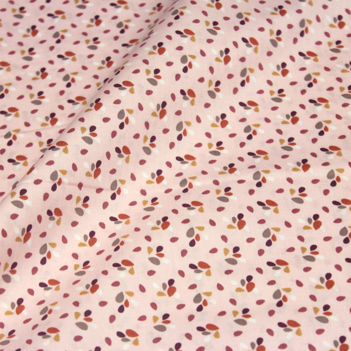 Tissu de coton rose aux gouttes bordeaux, jaunes, blanches, rouille - OEKO-TEX®