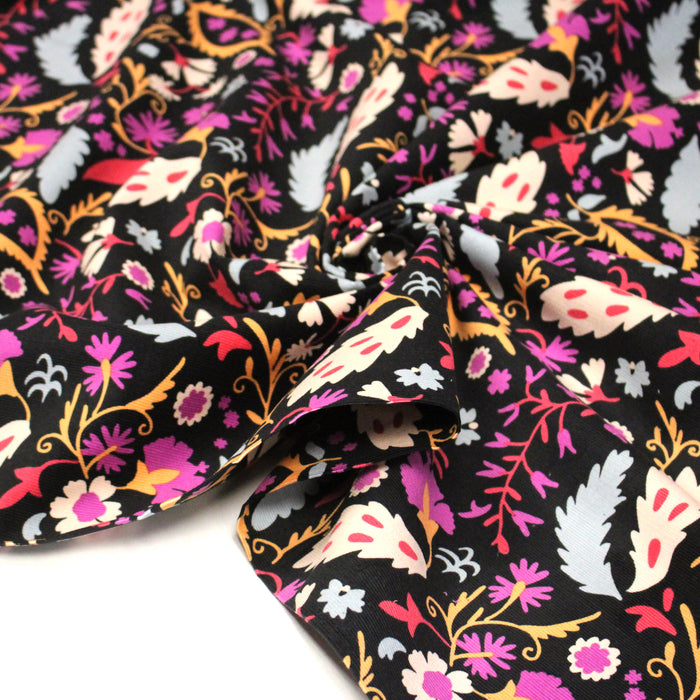Tissu velours milleraies imprimé noir aux fleurs roses oranges - STANDARD 100 OEKO-TEX