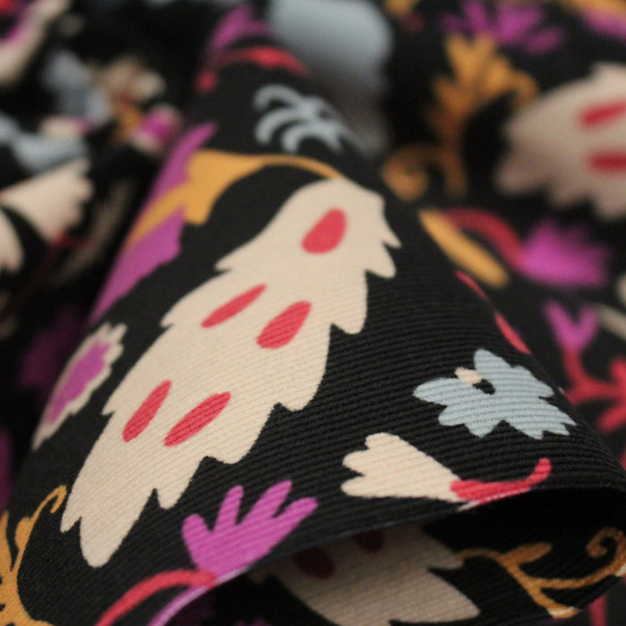 Tissu velours milleraies imprimé noir aux fleurs roses oranges - STANDARD 100 OEKO-TEX