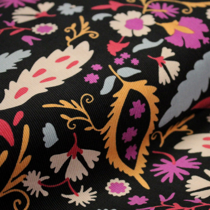 Tissu velours milleraies imprimé noir aux fleurs roses oranges - STANDARD 100 OEKO-TEX