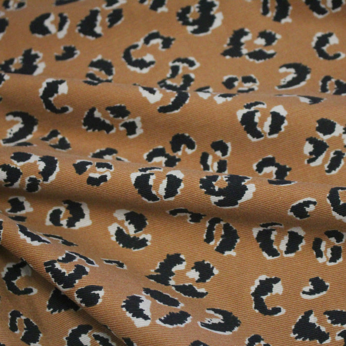 Tissu velours milleraies imprimé léopard havane & noir - STANDARD 100 OEKO-TEX