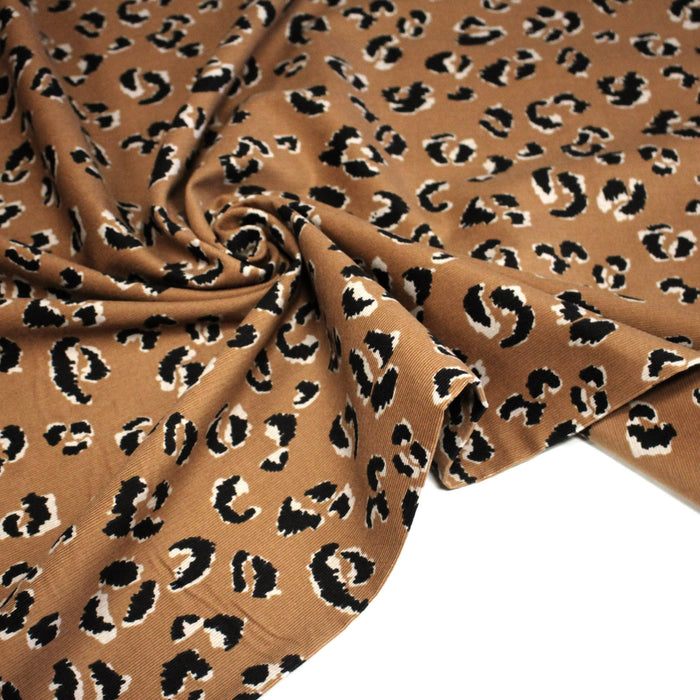 Tissu velours milleraies imprimé léopard havane & noir - STANDARD 100 OEKO-TEX