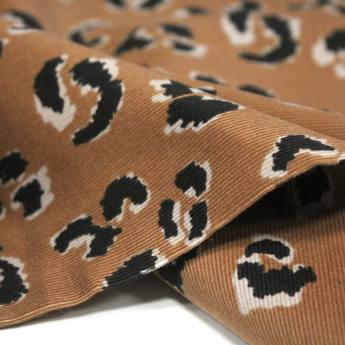 Tissu velours milleraies imprimé léopard havane & noir - STANDARD 100 OEKO-TEX