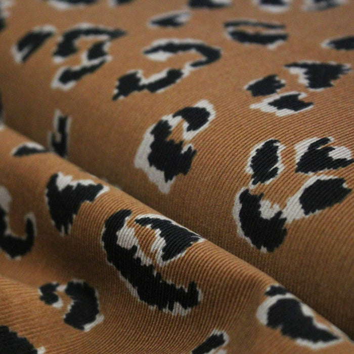 Tissu velours milleraies imprimé léopard havane & noir - STANDARD 100 OEKO-TEX
