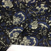 Tissu coton fin imprimé INDIENNES, noir aux fleurs traditionnelles écrues et bleues - TissusPapi.com