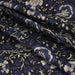 Tissu coton fin imprimé INDIENNES, noir aux fleurs traditionnelles écrues et bleues - TissusPapi.com