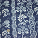 Tissu coton fin imprimé INDIENNES, bleu aux fleurs, frises et motifs géométriques bleu ciel et blancs - TissusPapi.com