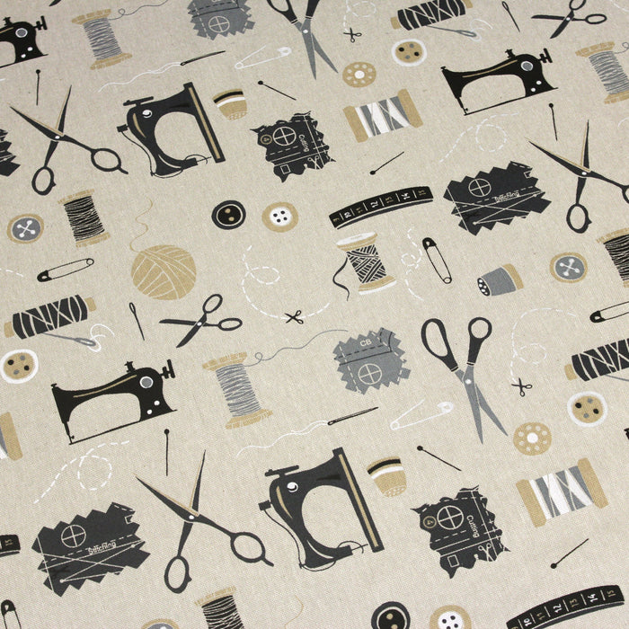Tissu de coton demi-natté façon lin LA COUTURE, aux illustrations noir & blanc de matériel de couture, machine à coudre