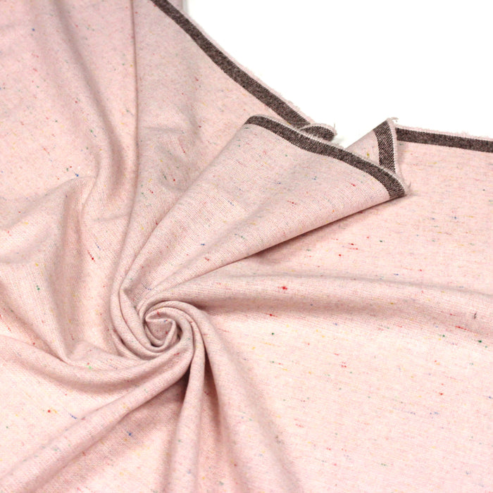 Tissu lainage faux-uni tweed rose aux touches rouges - Fabrication italienne