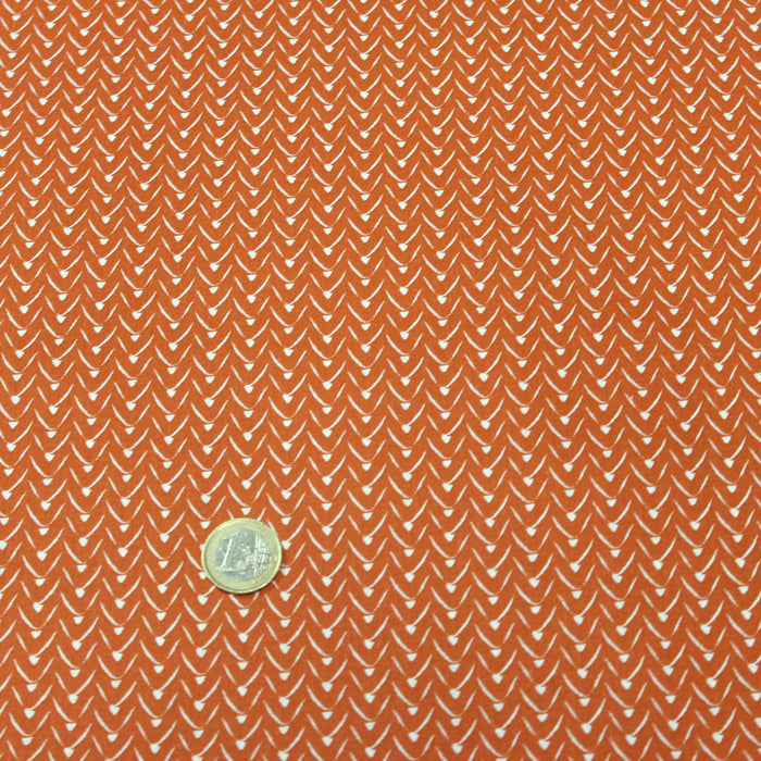 Tissu de coton aux motifs graphiques blancs, fond orange - OEKO-TEX®