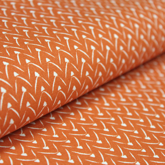 Tissu de coton aux motifs graphiques blancs, fond orange - OEKO-TEX®
