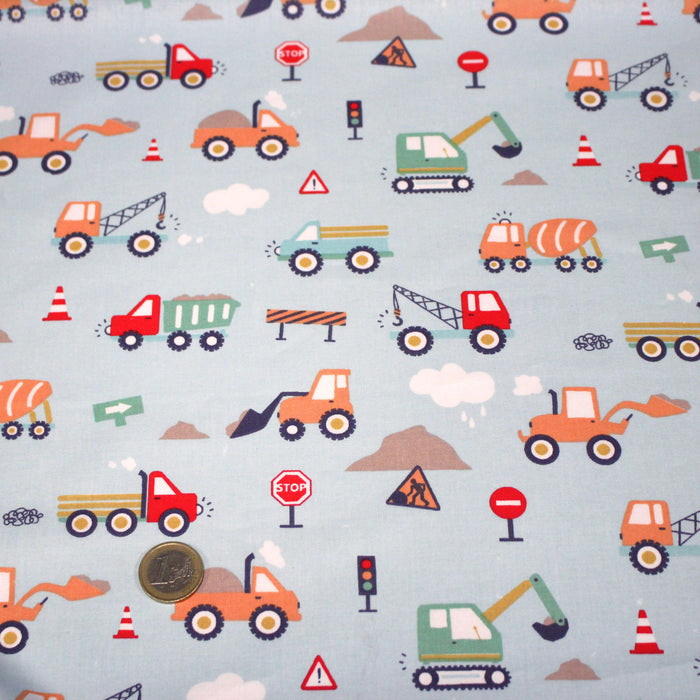 Tissu cotonnade enfant bleu aux grues, camions et tracteurs - STANDARD 100 OEKO-TEX