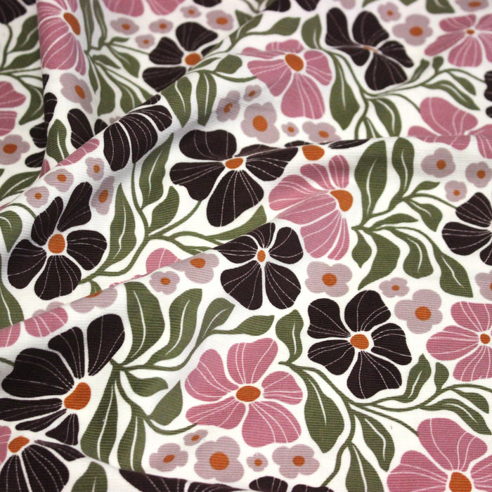 Tissu velours milleraies imprimé SEVENTIES, fleuri rose & aubergine, feuilles vertes - STANDARD 100 OEKO - TEX - TissusPapi.com