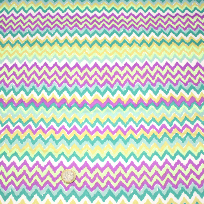 Tissu gabardine coton imprimé motif géométrique ZIG ZAG vert fluo blanc jaune mauve