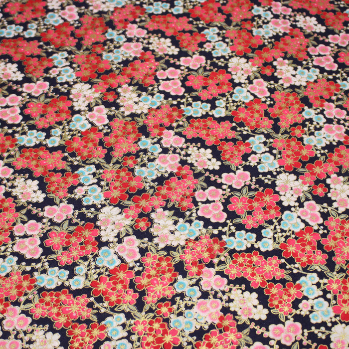 Tissu cotonnade bleu marine aux fleurs sakura rouges blanches et dorées - COLLECTION JAPON DORÉ