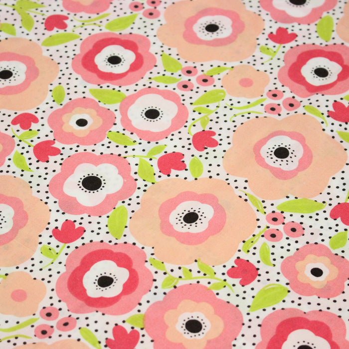 Tissu cotonnade aux belles fleurs roses graphiques sur fond blanc pois noirs - COLLECTION ÉTÉ - TissusPapi.com
