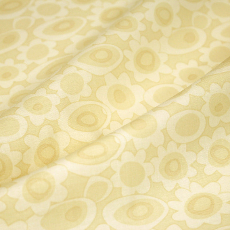 Tissu cotonnade jaune aux fleurs stylisées 70s jaunes - COLLECTION SEVENTIES - TissusPapi.com