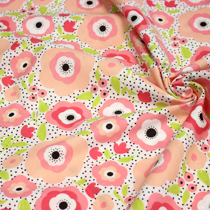 Tissu cotonnade aux belles fleurs roses graphiques sur fond blanc pois noirs - COLLECTION ÉTÉ - TissusPapi.com