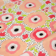 Tissu cotonnade aux belles fleurs roses graphiques sur fond blanc pois noirs - COLLECTION ÉTÉ - TissusPapi.com