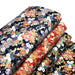 Tissu cotonnade motif japonais traditionnels : fleuris multicolores, fond noir / bleu / rouge - COLLECTION JAPON DORÉ - TissusPapi.com