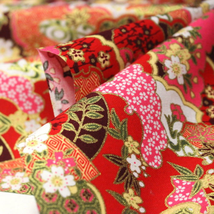 Tissu cotonnade motif japonais traditionnels : fleurs de cerisier, nuages et motifs géométriques dorés, fond bleu / rouge - COLLECTION JAPON DORÉ - TissusPapi.com