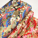 Tissu cotonnade motif japonais traditionnels : fleurs de cerisier, nuages et motifs géométriques dorés, fond bleu / rouge - COLLECTION JAPON DORÉ - TissusPapi.com