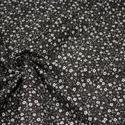 Tissu cotonnade noir aux fleurs blanches - OEKO - TEX - TissusPapi.com