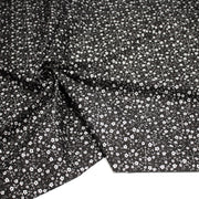 Tissu cotonnade noir aux fleurs blanches - OEKO - TEX - TissusPapi.com
