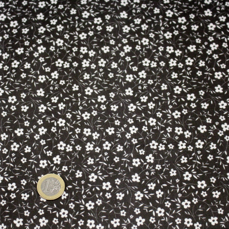 Tissu cotonnade noir aux fleurs blanches - OEKO - TEX - TissusPapi.com