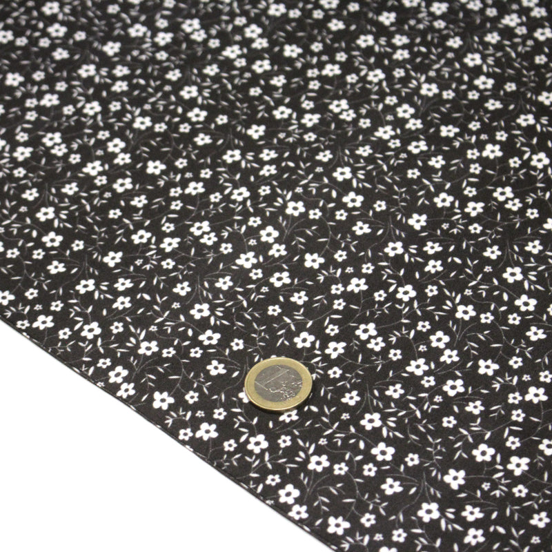 Tissu cotonnade noir aux fleurs blanches - OEKO - TEX - TissusPapi.com