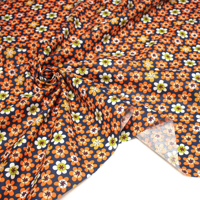 Tissu cotonnade bleu aux fleurs oranges seventies - OEKO-TEX STANDARD 100