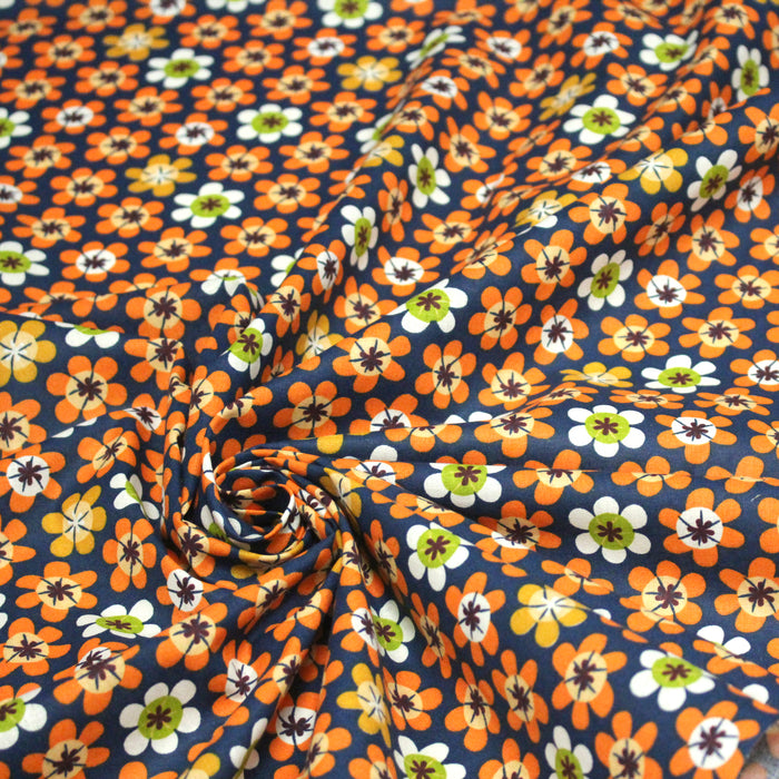 Tissu cotonnade bleu aux fleurs oranges seventies - OEKO-TEX STANDARD 100