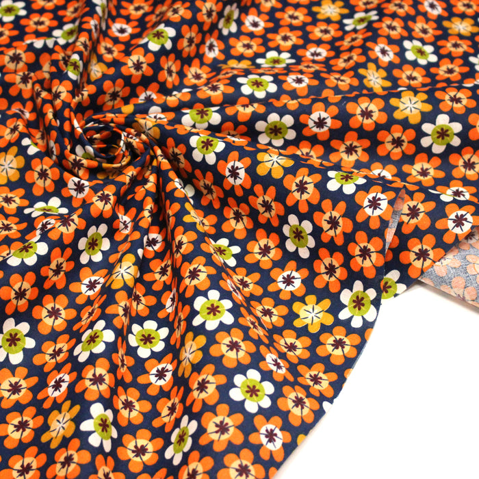 Tissu cotonnade bleu aux fleurs oranges seventies - OEKO-TEX STANDARD 100
