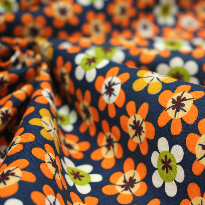 Tissu cotonnade bleu aux fleurs oranges seventies - OEKO-TEX STANDARD 100