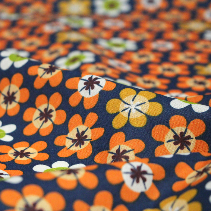 Tissu cotonnade bleu aux fleurs oranges seventies - OEKO-TEX STANDARD 100