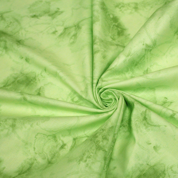 Tissu de coton Batik faux-uni marbré vert pistache