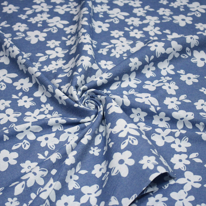 Tissu Chambray de coton bleu aux fleurs blanches - OEKO-TEX