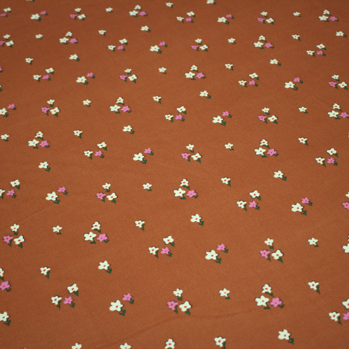 Tissu velours milleraies imprimé rouille aux fleurs écrues et roses - OEKO-TEX