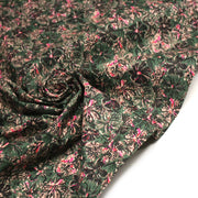 Tissu cotonnade ESTORIL fleuri vert aux touches noires, fuchsia et écrues - STANDARD 100 OEKO - TEX - TissusPapi.com