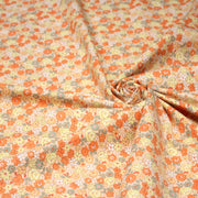 Tissu popeline coton fleurie orange jaune vert fond orange - OEKO - TEX - TissusPapi.com